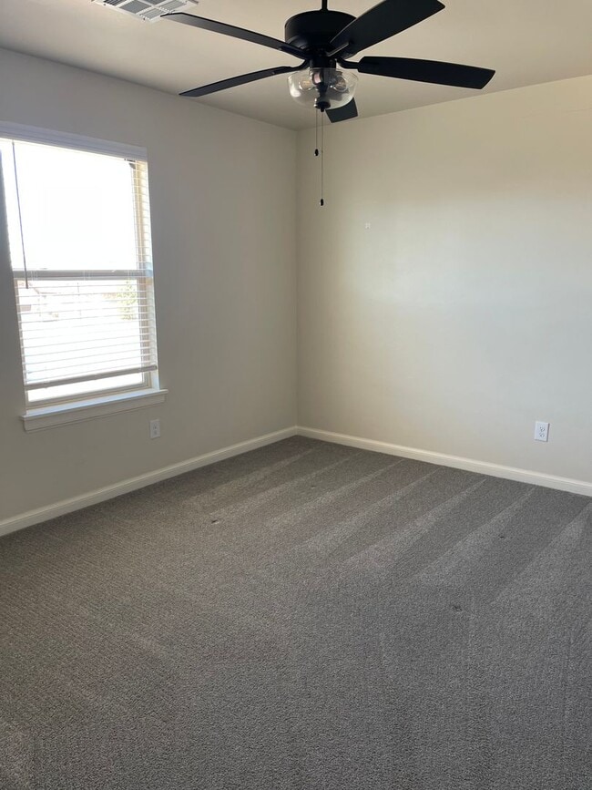 Building Photo - *Fully Furnished* 4 bedroom, 2.5 bathroom, 2 car garage Gated Neighborhood