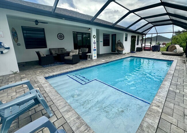 Building Photo - Fully Furnished Annual Rental- 3 Bedroom 2 Bathroom - Pool and Waterfront- NE CAPE CORAL