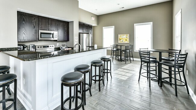 Building Photo - First Floor Rear View Three Bedroom in a Gated Community!