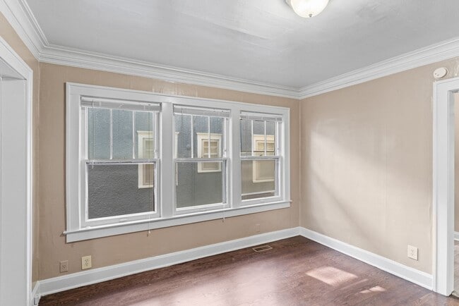 Building Photo - Charming 2-Bed Home with Hardwood Floors & Bright, Open Living Spaces!