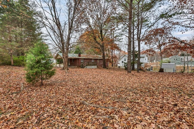 Building Photo - Cozy 3BR Home with Spacious Yard & XL Carport!