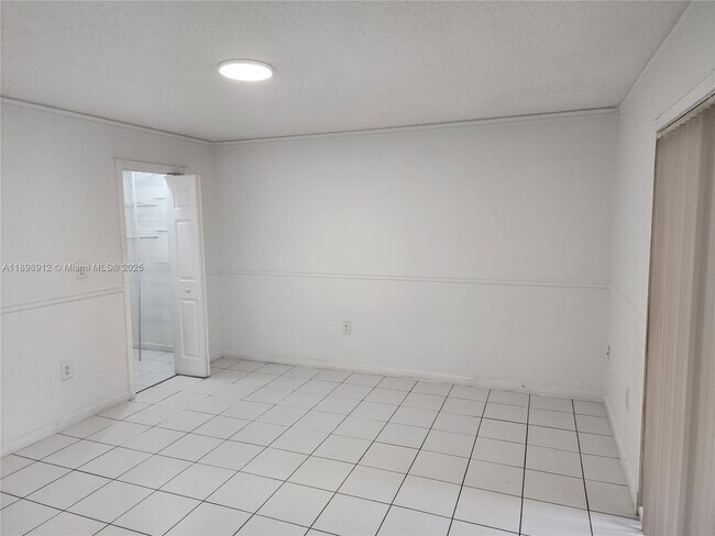 Building Photo - 10879 NW 7th St