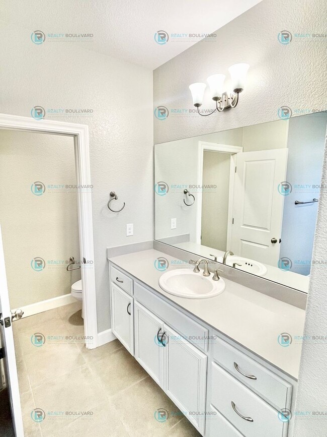 Building Photo - Discover luxurious living in this stunning 3-bedroom, 2-bathroom, 2-story condo, perfectly design...