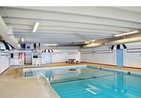 Building Photo - Comfortable 2-Bedroom Condo Near Lake Minnetonka – Private Deck & Resort-Style Amenities