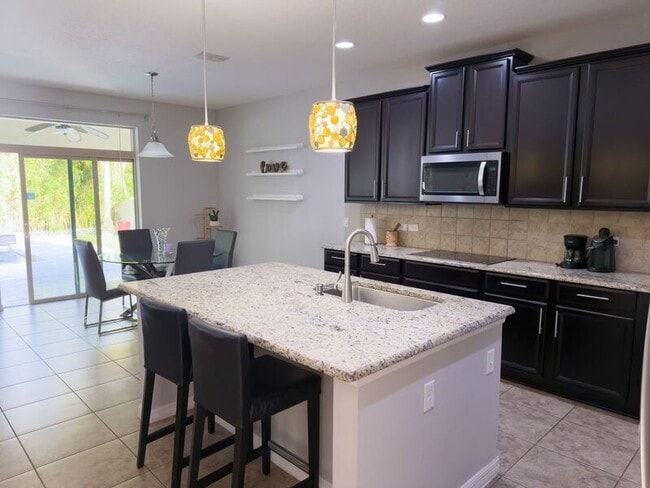 Building Photo - 14823 Golden Sunburst Ave