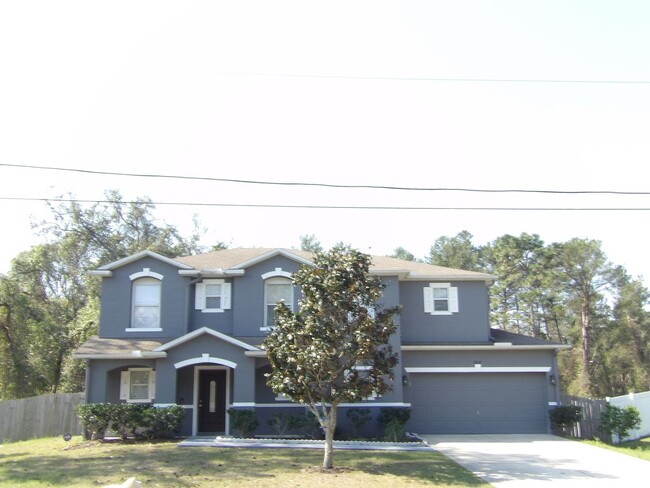 Building Photo - 4 Bedroom 2.5 Bath 2 Car garage Carole Arc...