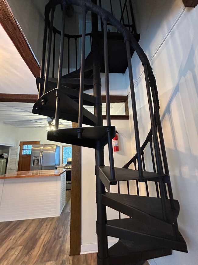 Circular staircase to 2nd floor - 11761 N River Rd