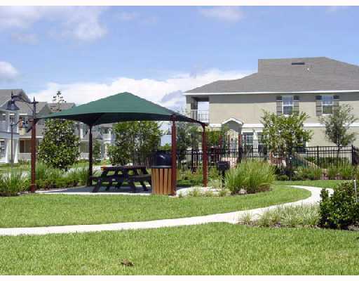 Building Photo - MOVE IN SPECIAL- Beautiful 3/2.5 Harmony Condo.