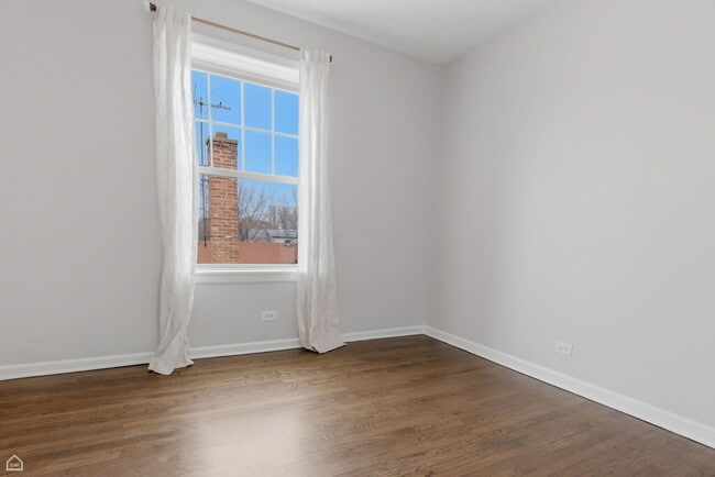 Building Photo - 7318 N Honore St