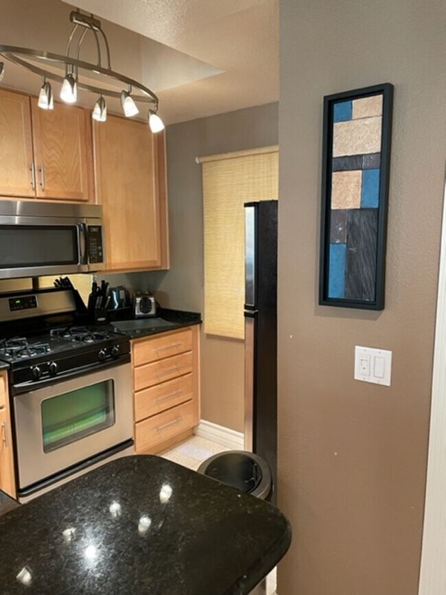 Building Photo - Meridian STUDIO Condo Fully Furnished near Main Pool-Lush Green trees in Resort Style Community.