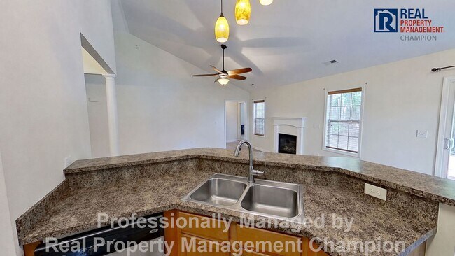 Building Photo - 3BD/2BA home w/vaulted ceilings, fireplace, 2-car garage, deck and fenced backyard
