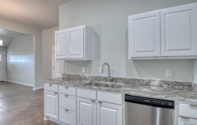 Building Photo - Brand New Construction in Varenna Landing! Storm shelter and lawn care included!