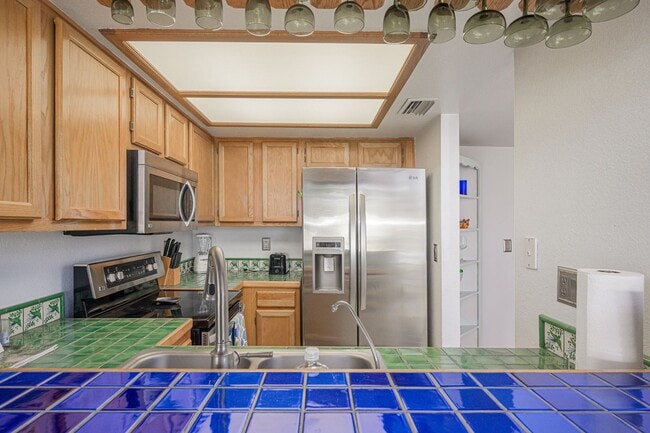 Building Photo - Live ON THE COLORADO RIVER – Fully Furnished 1 Bed/1 Bath Condo in the Gated Community of Roadhav...