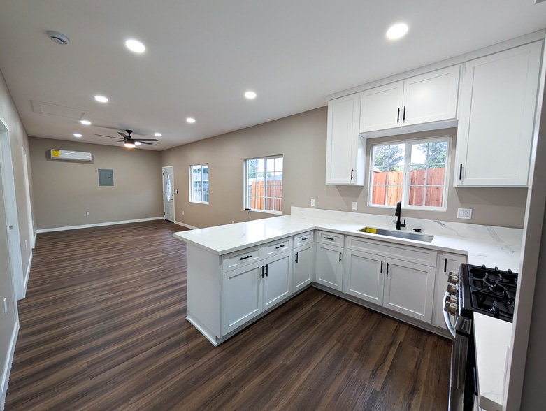 Kitchen with open concept living room Kitchen with open concept living room - 14962 Lambert Rd