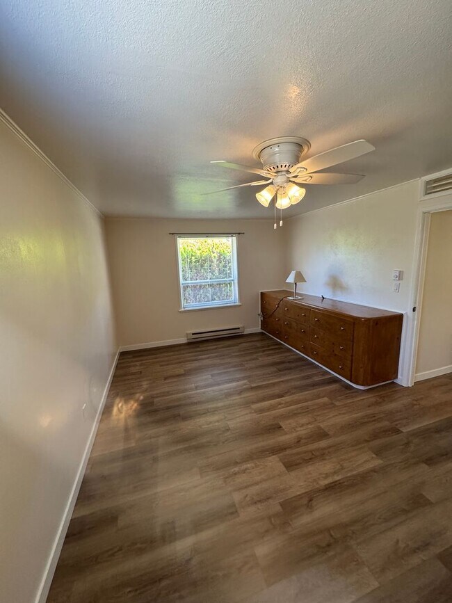Building Photo - Charming Updated 2 Bedroom Home with Huge Backyard, A/C & Owner-Paid Landscaping