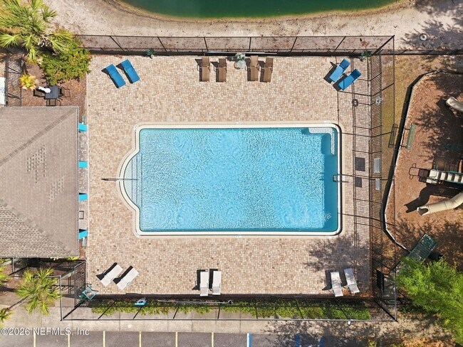 Building Photo - Ground Floor 2 bedroom 2 bathroom Condo in Gated Community with Amenities