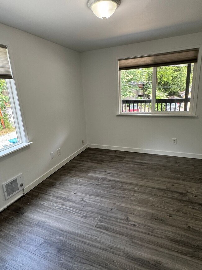 Building Photo - Spacious Two Story (2BR/1BA) Home with Large Fenced-In Yard