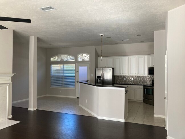 kitchen and dining area - 35 Auburn Path Dr