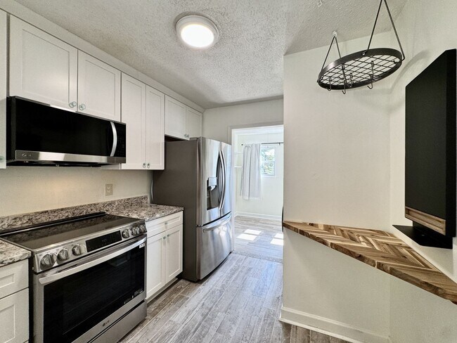 Building Photo - Ready NOW! A Custom Townhouse-Style Duplex Blocks to the Beaches! Fenced Yard - Hot Tub - Pet Fri...