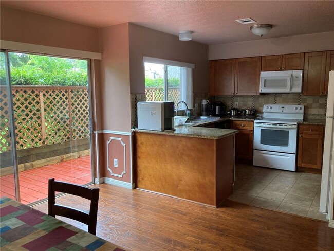 Building Photo - Totally updated townhome, Laminate Floor l...