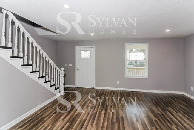 Building Photo - Turn the key. Enter. Smile. Repeat every day!