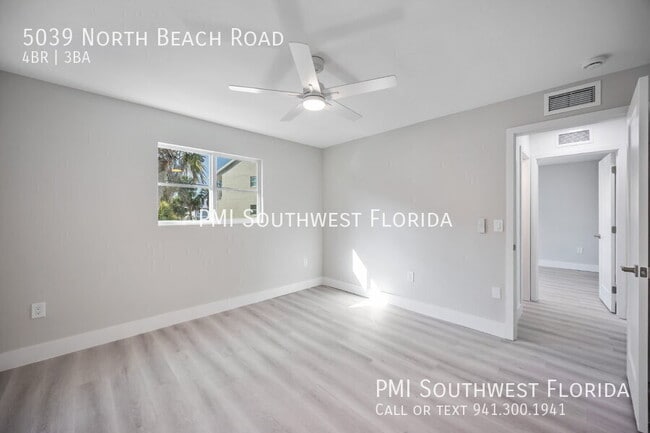 Building Photo - 5039 N Beach Rd