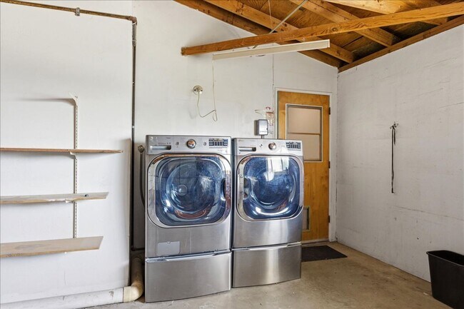Building Photo - 3 bed / 2 Bath Mid-Century Home with Two-Car Garage, Soaking Pool and Manicured Backyard!