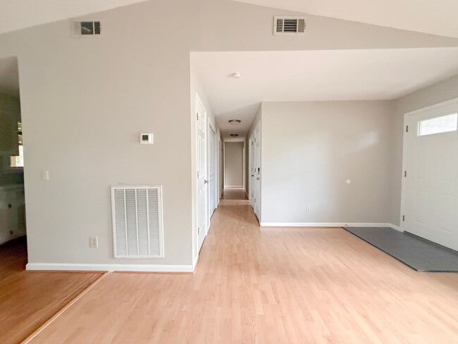 Building Photo - Spacious 3-Bedroom Home with Screened Porch, 2-Car Garage + Workshop