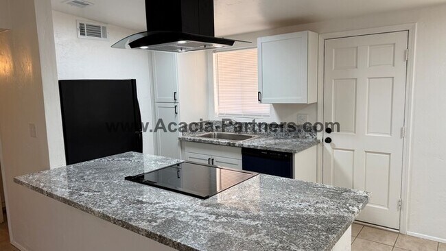 Building Photo - Three Bedroom/Two Bath Home