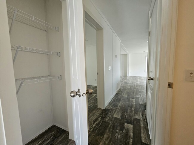 Building Photo - 6691 Hidden Oaks Dr