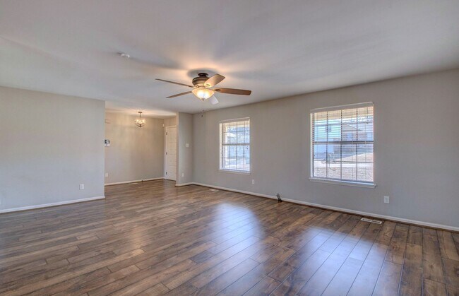 Building Photo - Welcome Home: Charming Brick Beauty with Covered Porch.