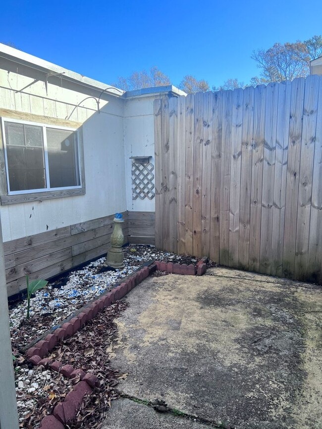 Building Photo - Introducing a 2-bedroom, 1.5-bathroom condo that offers the perfect blend of comfort and convenie...