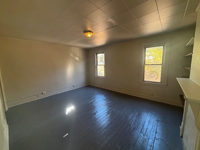 Building Photo - Updated flooring, finished basement, and great outdoor space in a walkable Swissvale location