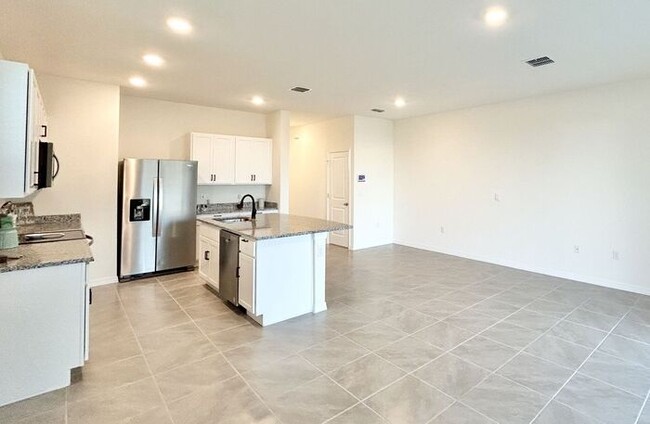 Building Photo - Brand New 3/2.5 Modern Townhome with a Lof...