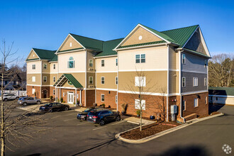 Building Photo - The Acorn Suites -Premium Extended Stay Hotel