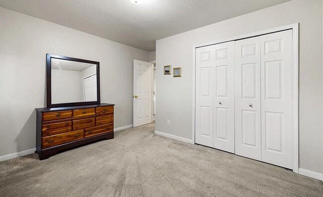 Building Photo - Spacious 5-Bedroom Home with Bonus Entertainment Room & Low-Maintenance Yard