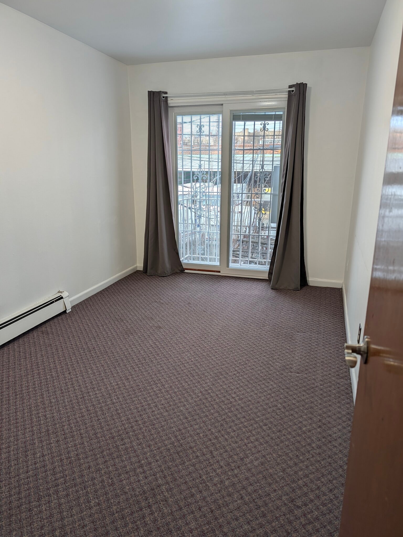 Bedroom with balcony - 3916 62nd St