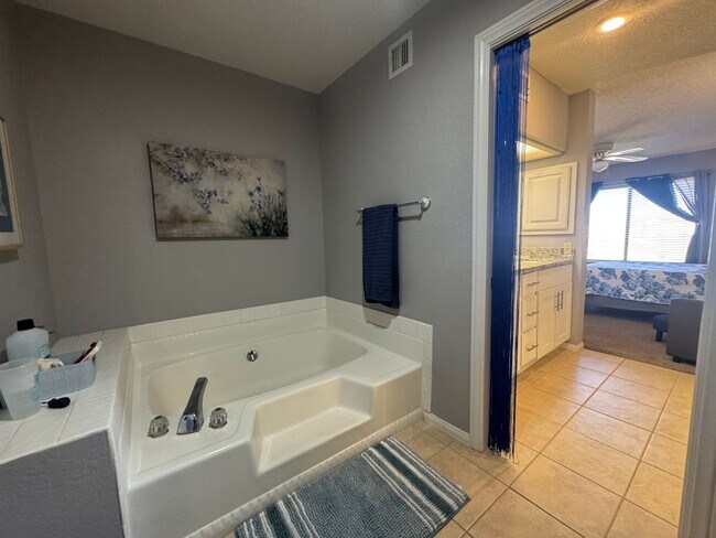 Building Photo - FURNISHED 2BR CONDO w/Utilities Water View Gated NO STAIRS