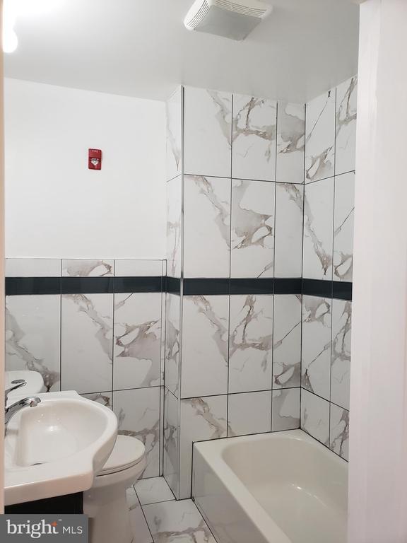 Building Photo - 5109 Woodland Ave