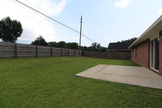 Building Photo - Executive 3-Bedroom Brick Home with Florid...