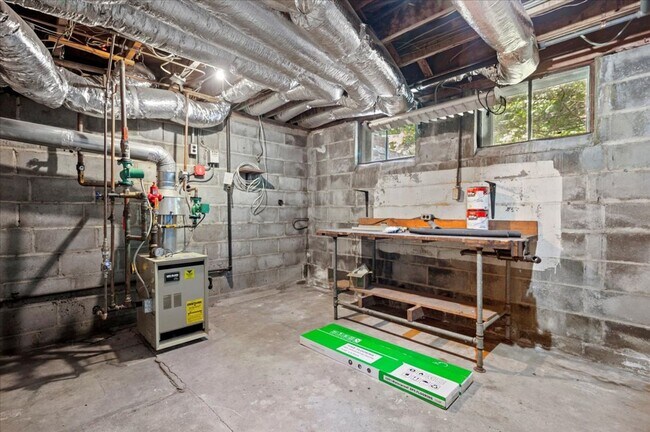 Building Photo - Elegant Multi-Level Brick Residence with Outdoor Oasis