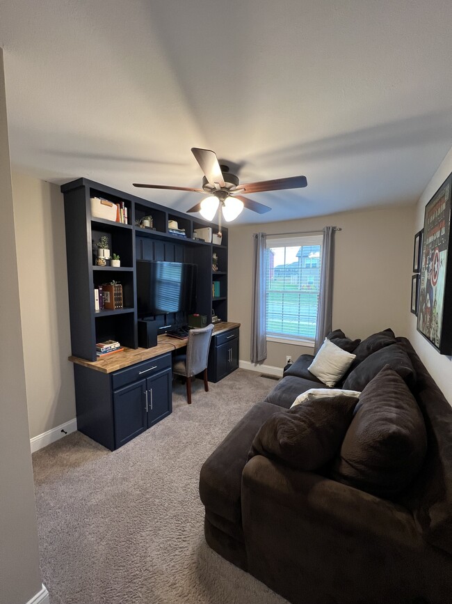 wide view of third bedroom. Desk is no longer available. - 2053 Jackie Lorraine Dr