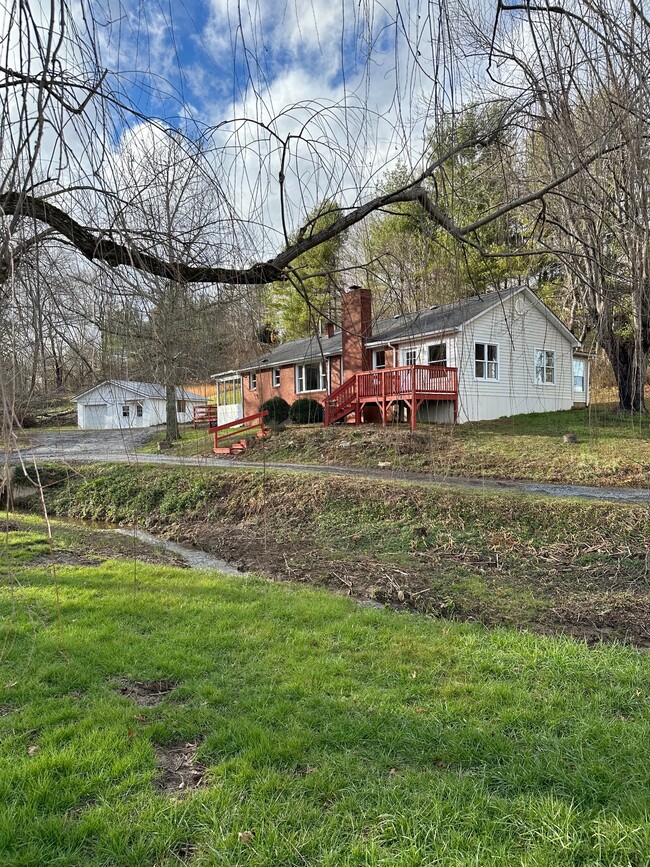 Front, showing house and garage - 295 Carrie Ln