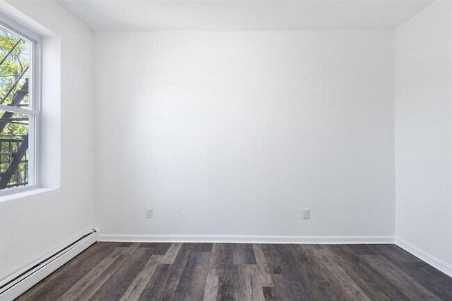 Building Photo - 310 Paterson Plank Rd