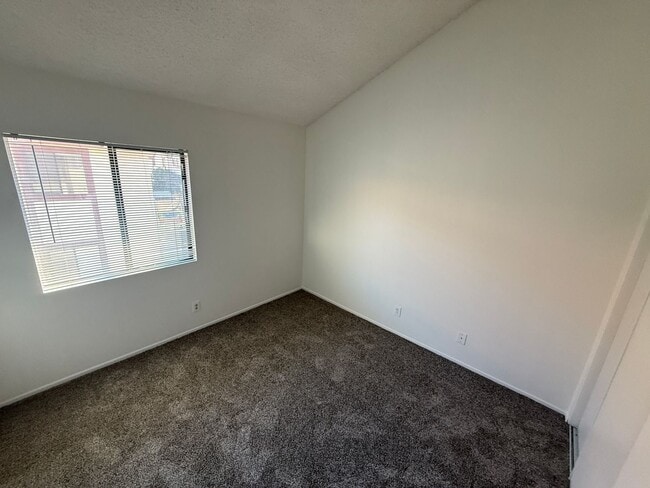 Building Photo - Charming 3-Bedroom Upper-Unit Condo in Can...