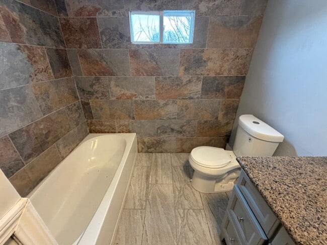 Building Photo - Charming 4-bed, 2-bath brick colonial home Contact KPM Detroit 313-429-3244