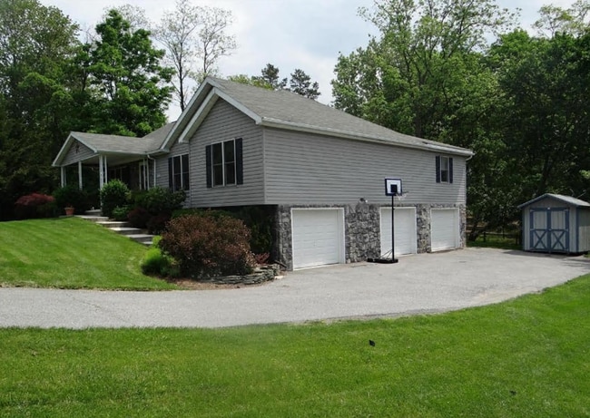 Building Photo - Spacious 5-Bedroom Home with Finished Base...