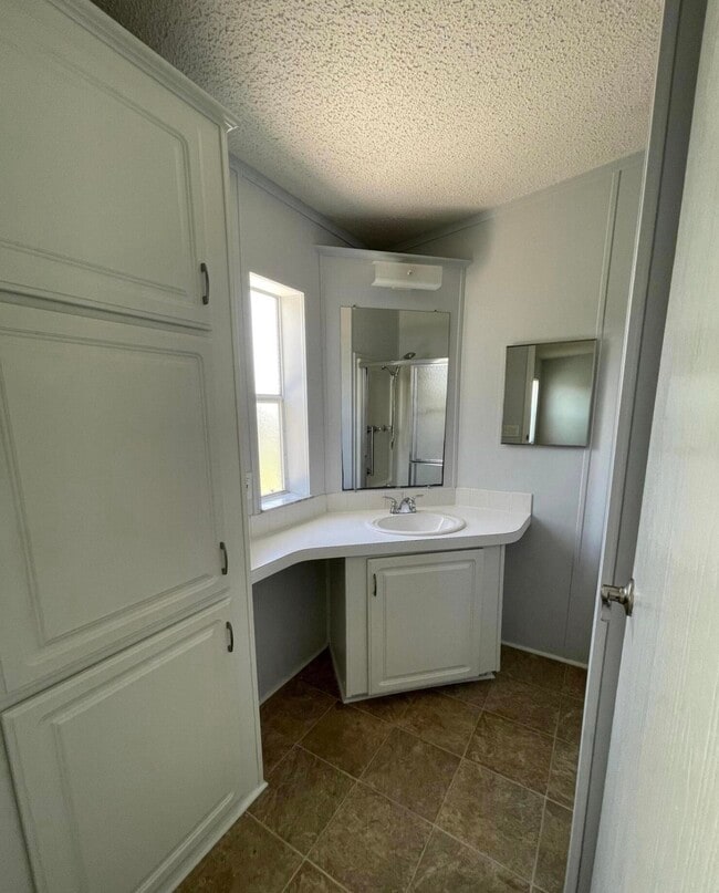 Building Photo - 8179 Sandwedge Terrace