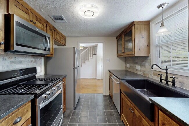 Building Photo - Title Completely Updated Historic Bryan Charmer with Modern Finishes & Timeless 1935 Character