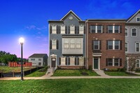 Building Photo - Large 4 bed 3 1/2 bath end unit in sought ...